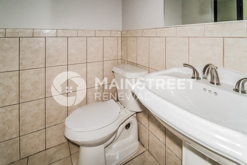 bathroom of a bathroom with a toilet and a sink