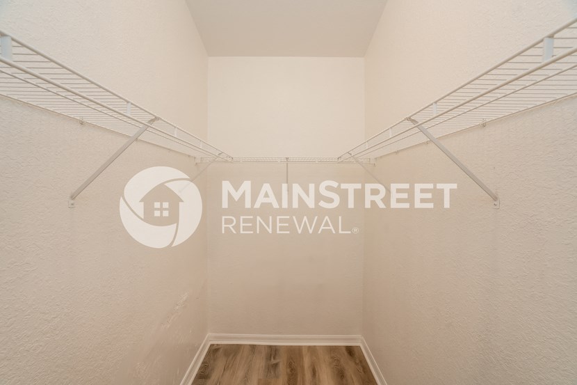 renovated room with closet in a house