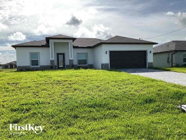 a house with a lawn in front of it