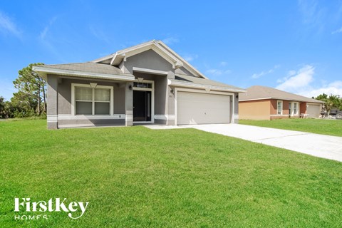 a house with a lawn in front of it