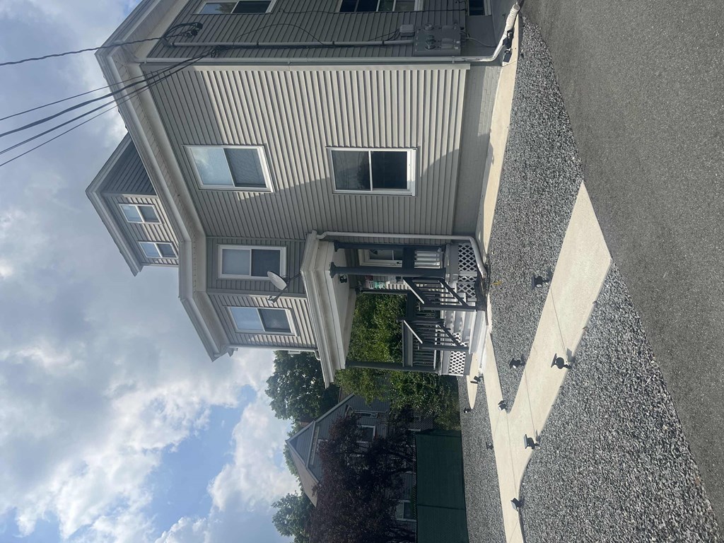 a view of a house from the top of the roof