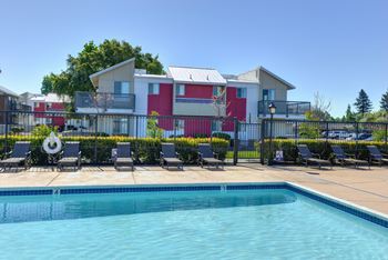 Pool with Apartment Exteriors, Trees at Addison Ranch Apartments, Petaluma, 94954