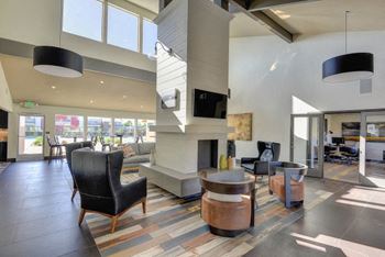 Clubhouse with Wood Inspired Floor, Chairs at Addison Ranch Apartments, Petaluma, CA, 94954