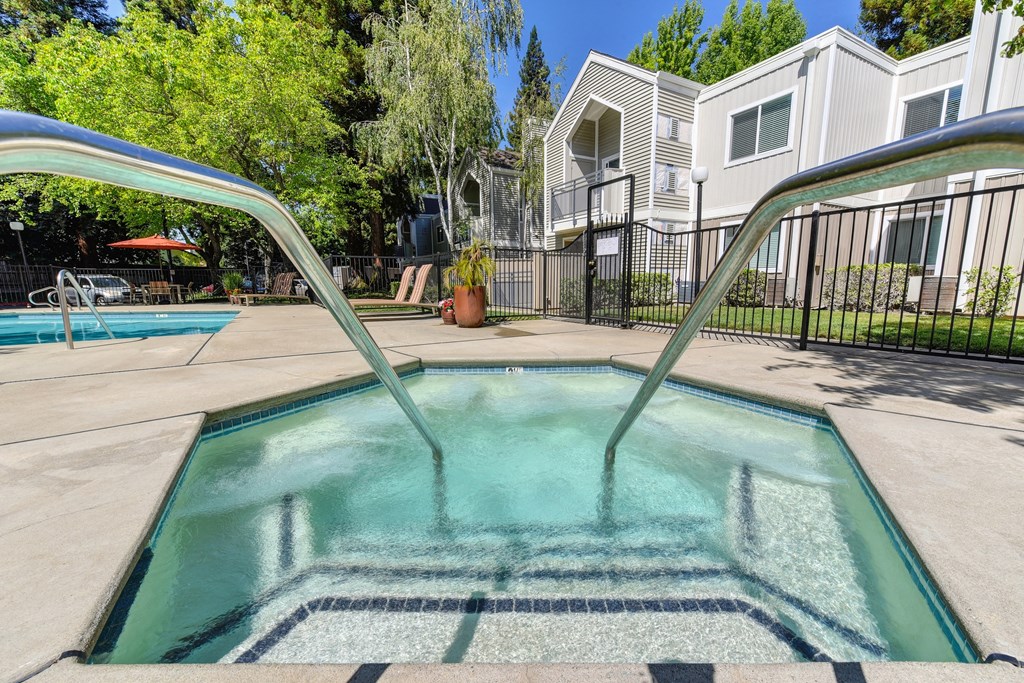 Spa and Pool with Saftey Rails, Apartment Exteriors and Gate at Rush River Apartments, California