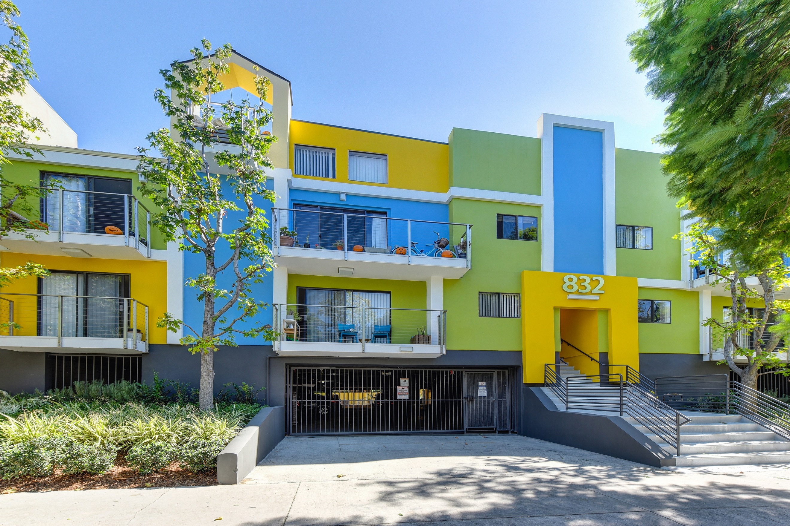 Community Entrance with Private Patios at Croft Plaza Apartments, West Hollywood California