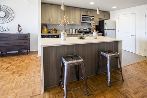 The Vue apartment kitchen with quartz counter tops