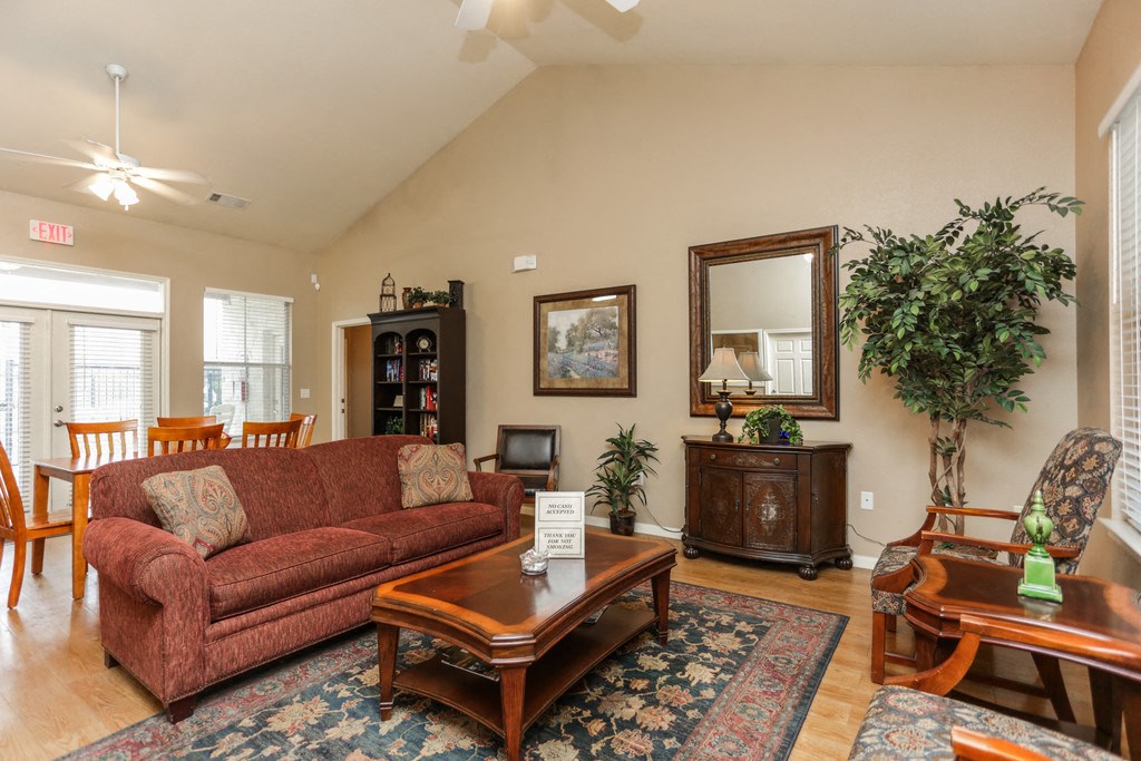 a living room with a couch and a table