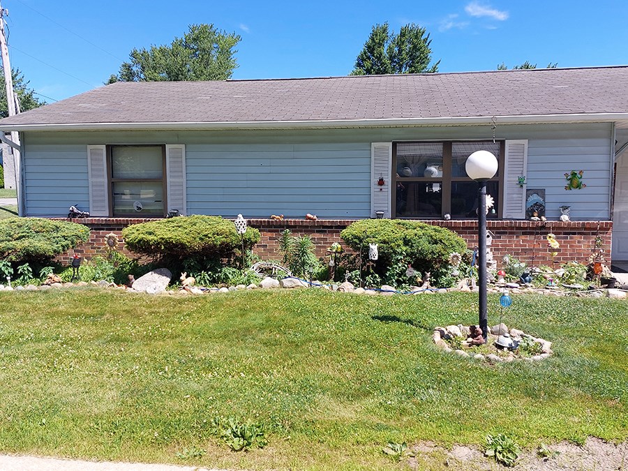 a house with a garden in front of it