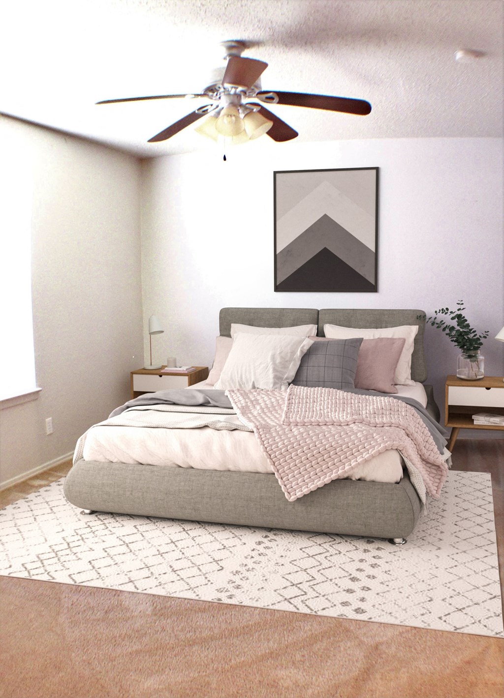 a bedroom with a bed and a ceiling fan