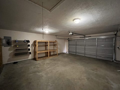 the garage is empty and ready to be remodeled