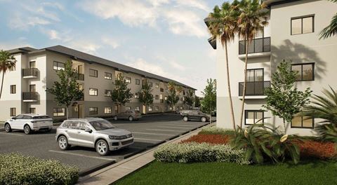 a rendering of an apartment complex with cars parked in a parking lot