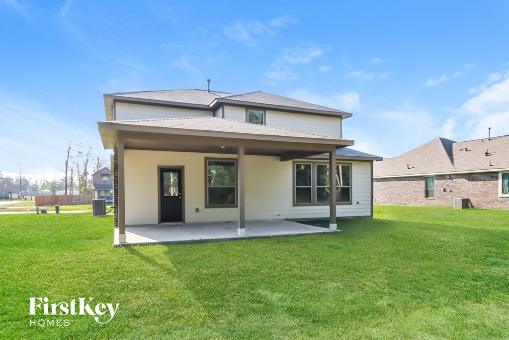 A house with a lawn in front of it is for sale.