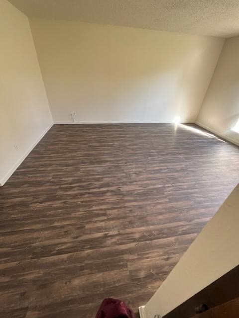 a empty room with a wooden floor in it