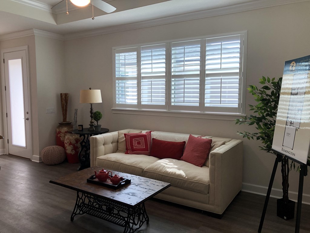 a living room with a couch and a table