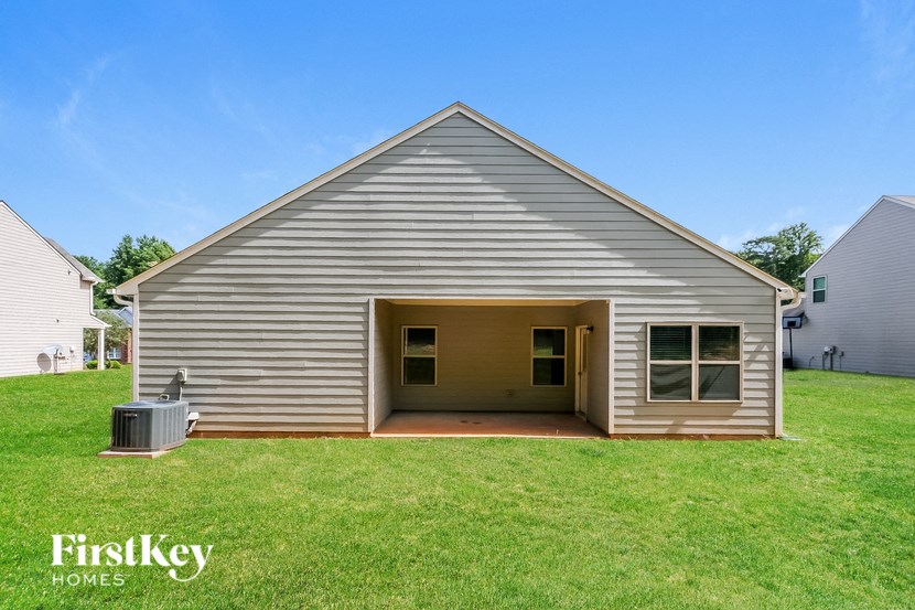 A small house with a garage door open is shown with the words "FirstKey Homes" on the bottom left.