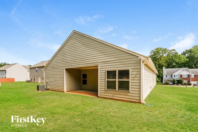 A house with a garage is for sale by FirstKey Homes.