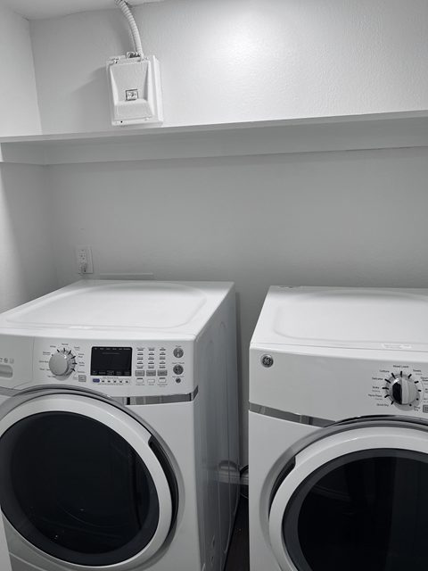 a washer and a dryer in a laundry room