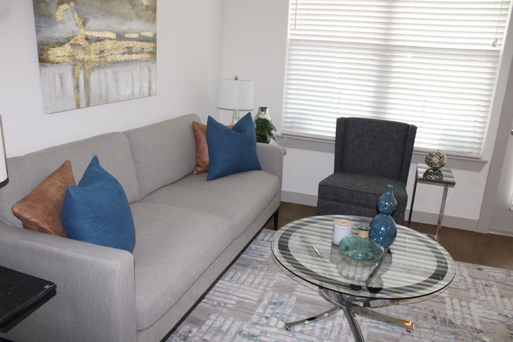 a living room with a couch and a coffee table