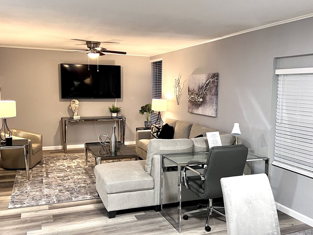 a living room with a couch and a table