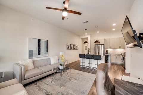 a living room with a couch and a table