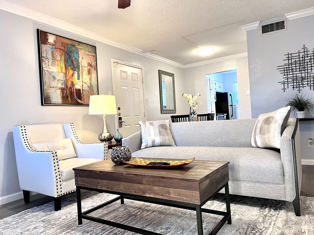 a living room with a couch and a coffee table