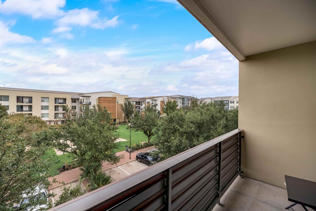 the view from the balcony of an apartment building