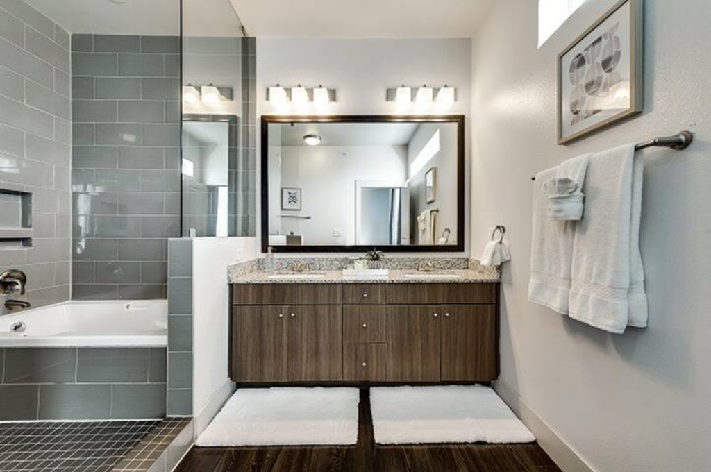 a bathroom with a sink and a mirror