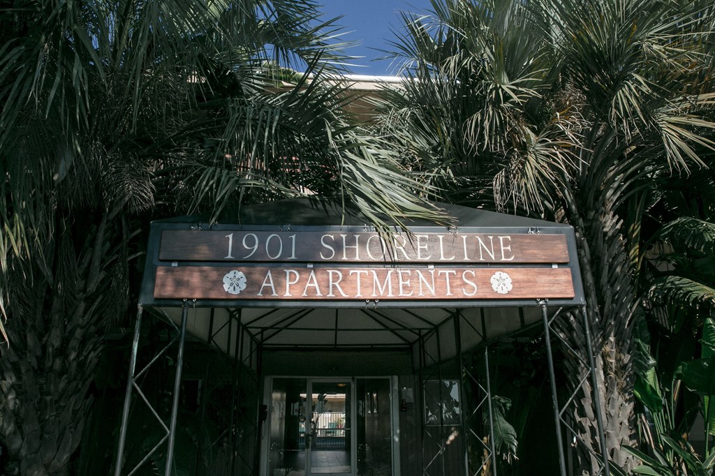 a building with a sign that reads 1901 shortline apartments