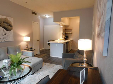 a living room with a couch and a table