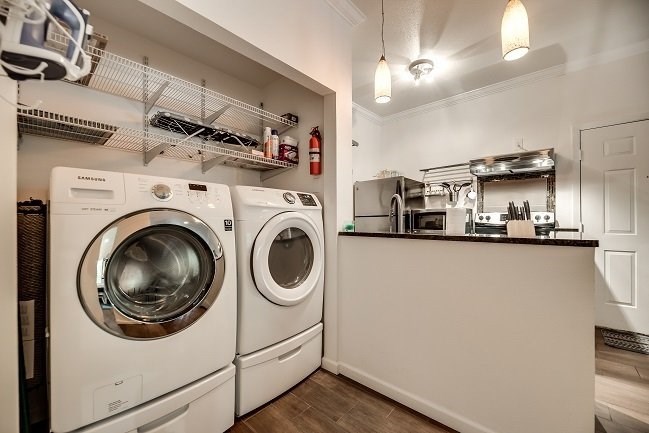 a laundry room with a washing machine and a dryer