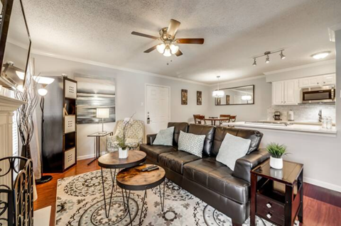a living room with a couch and a table