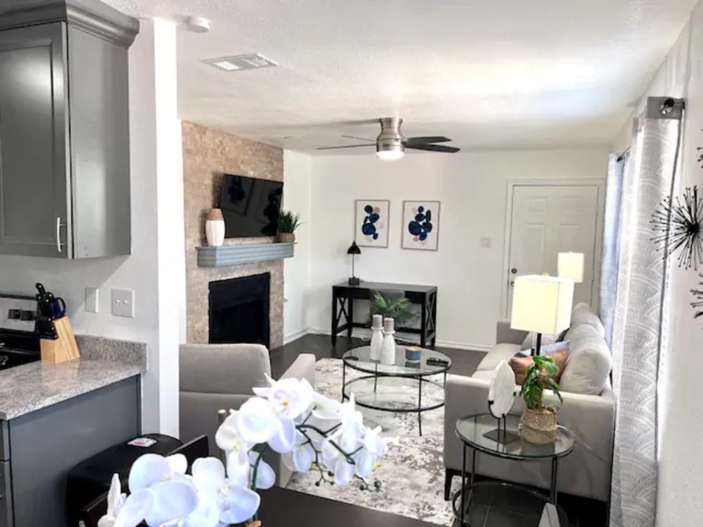 a living room with a couch and a table