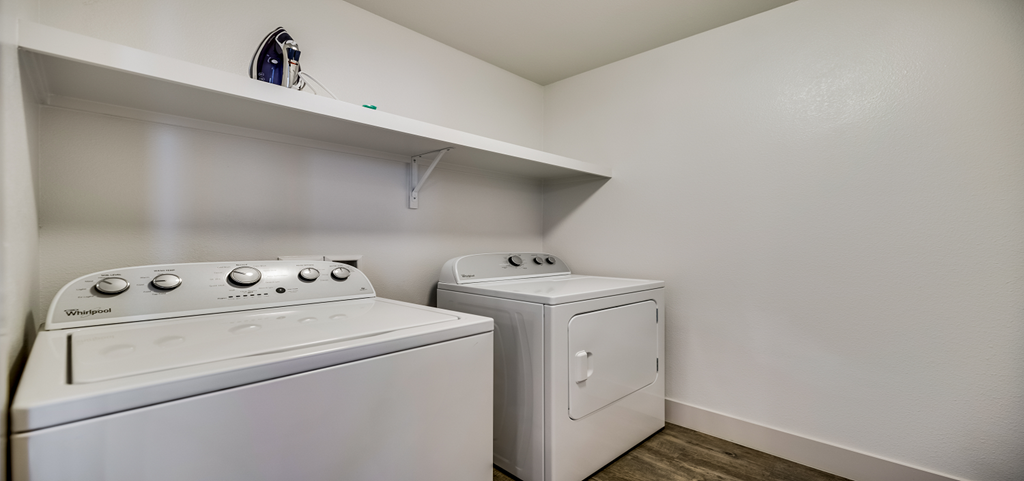 the preserve at ballantyne commons apartment laundry room with washer and dryer