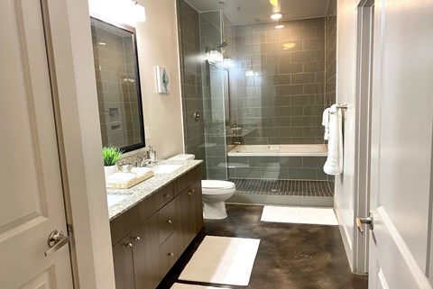 a small bathroom with a toilet and a shower