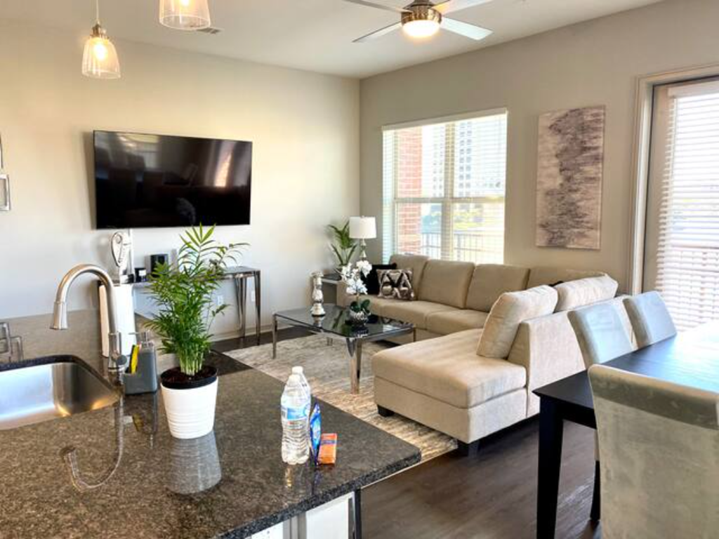 a living room with a couch and a table
