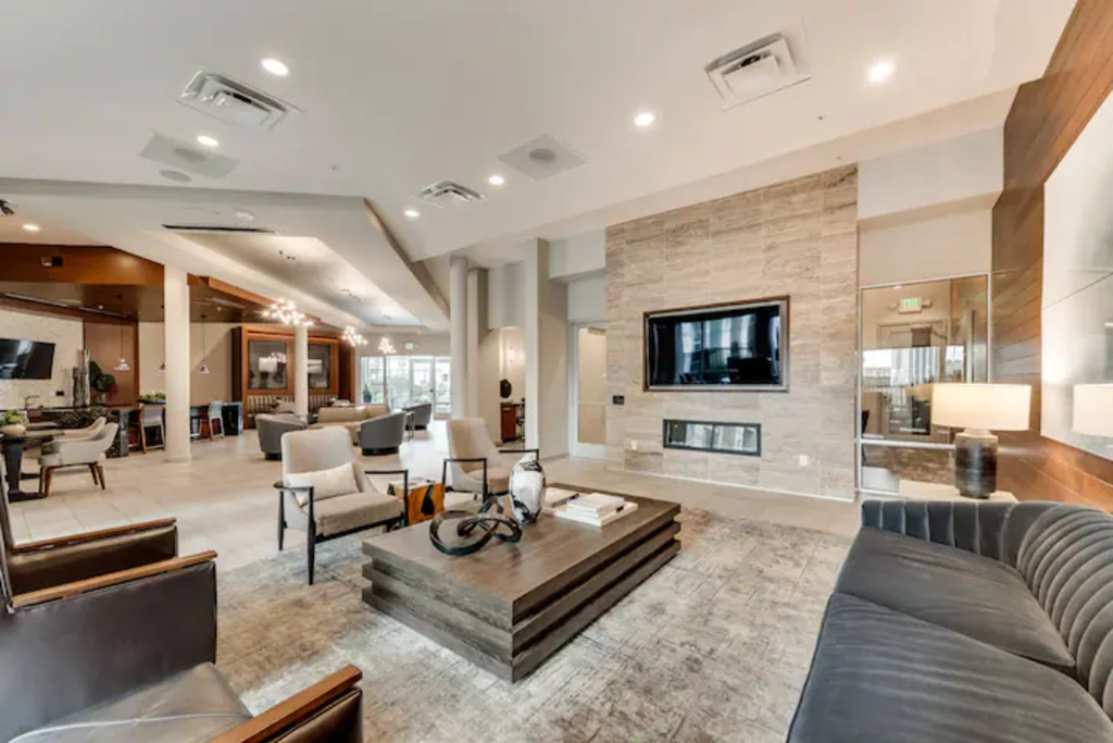 a living room with a couch and a television