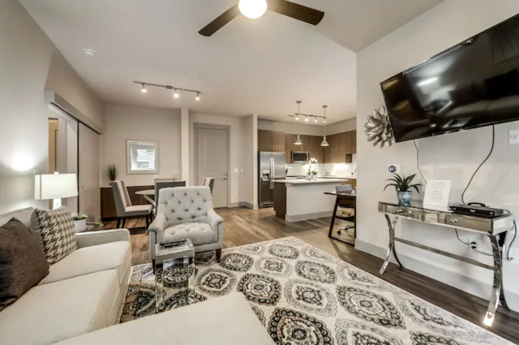 a living room with a couch and a tv
