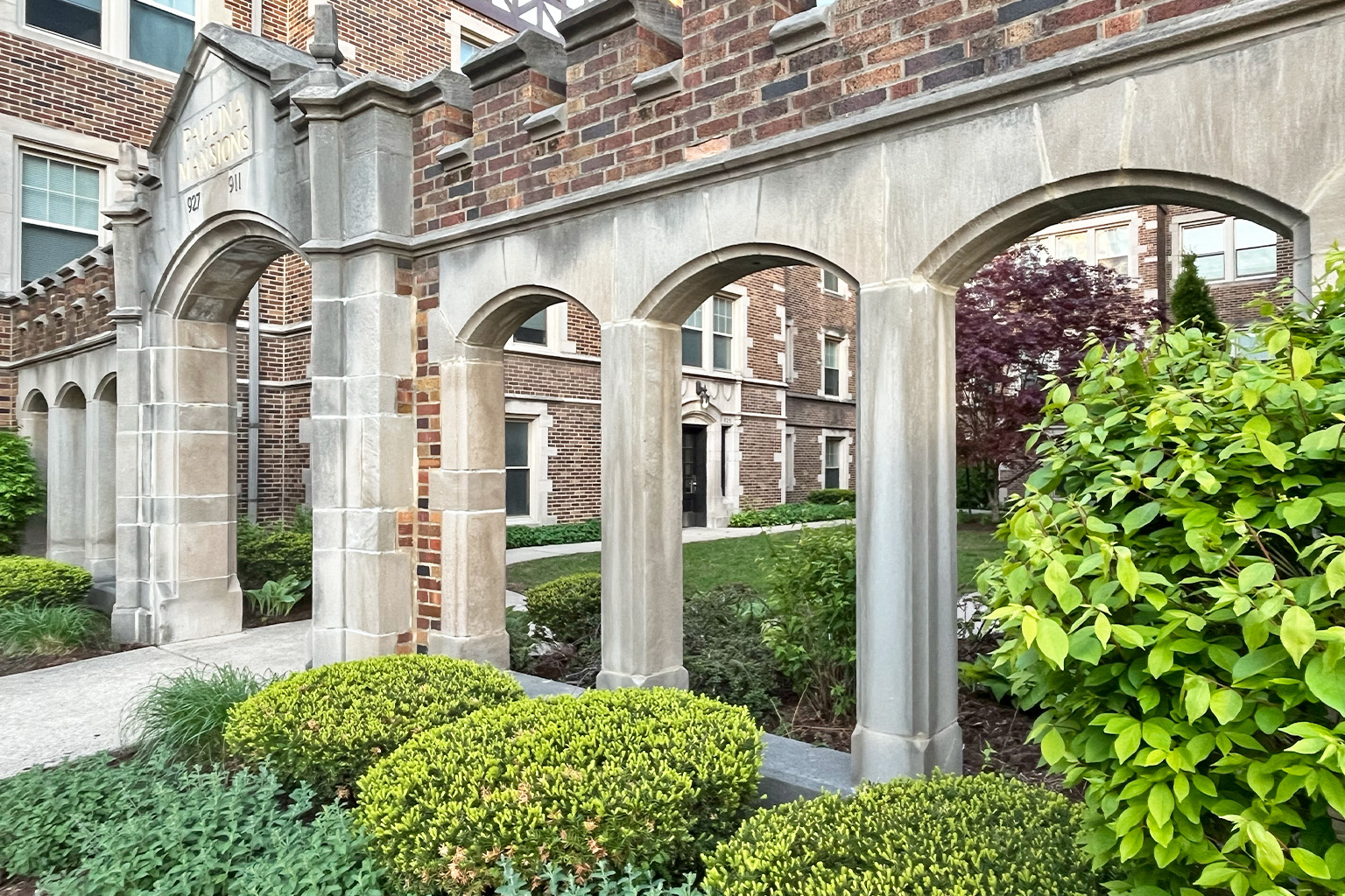 A building with arches and a sign that says "HOLY".
