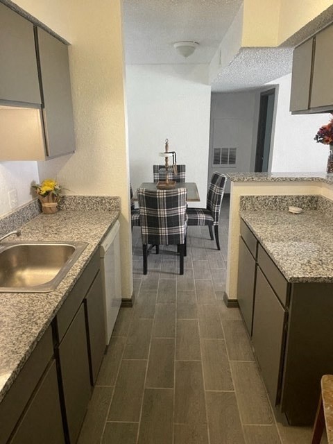 a kitchen with a sink and a table