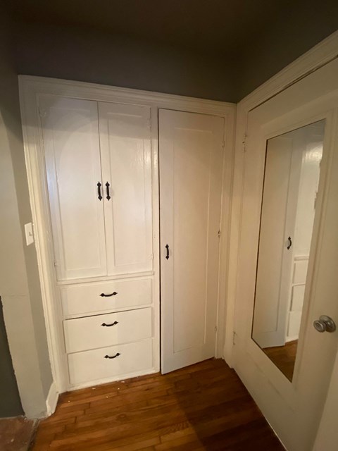 the closets in the hallway have been updated with new doors and drawers