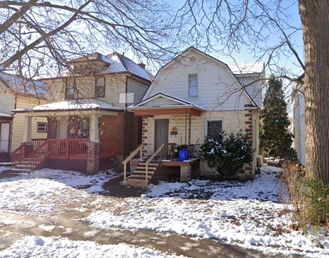 a house with snow on the ground