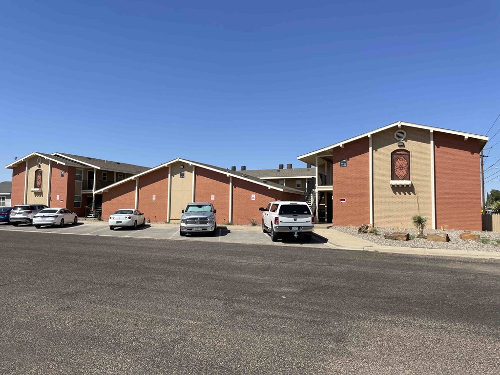 a church with cars parked in front of it