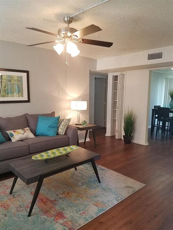 a living room with a couch and a coffee table