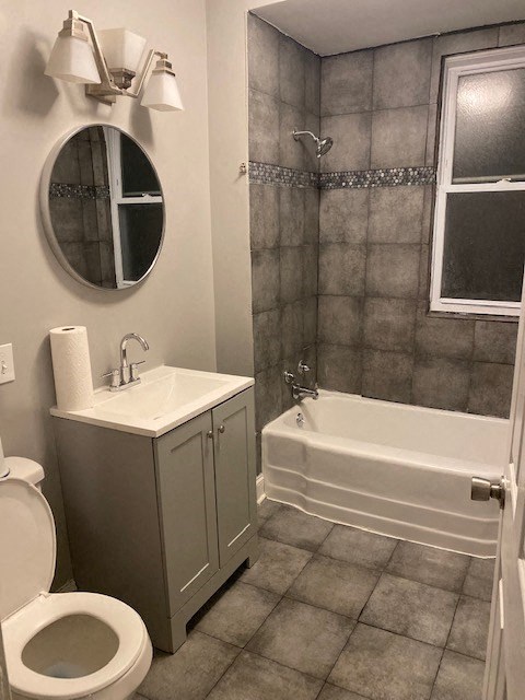 a bathroom with a sink toilet and a bath tub