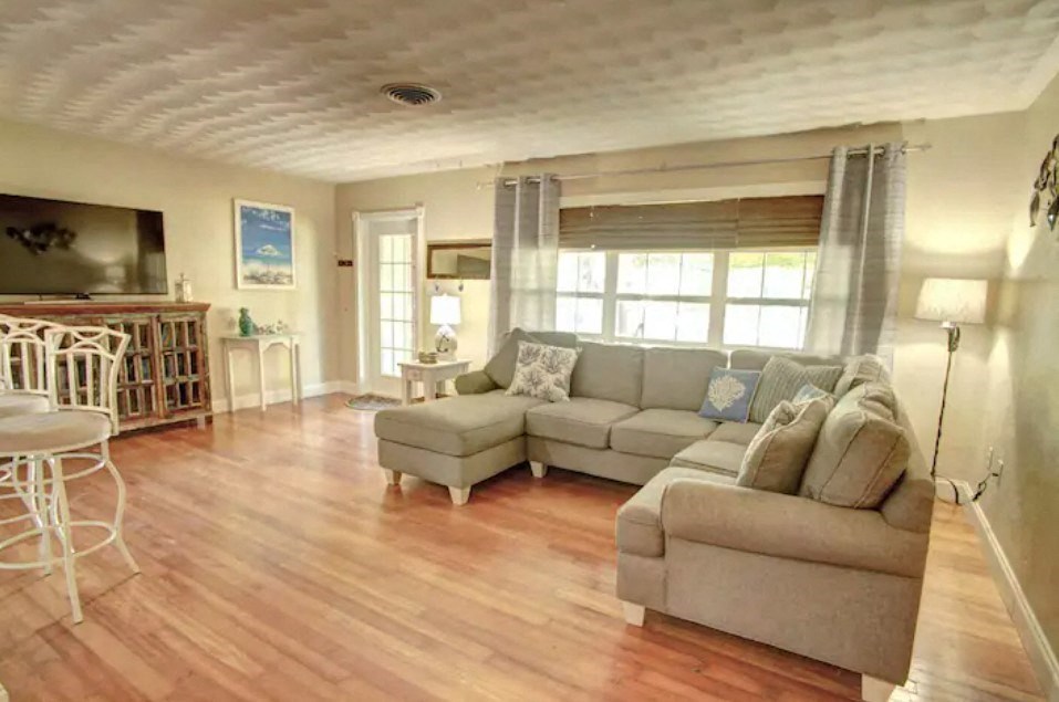 a living room with a couch and a table