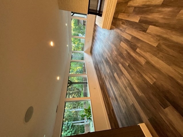 a view of the floor from the top of a staircase