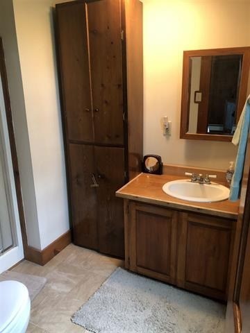 a bathroom with a sink and a shower