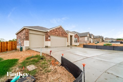 an empty yard in front of a house