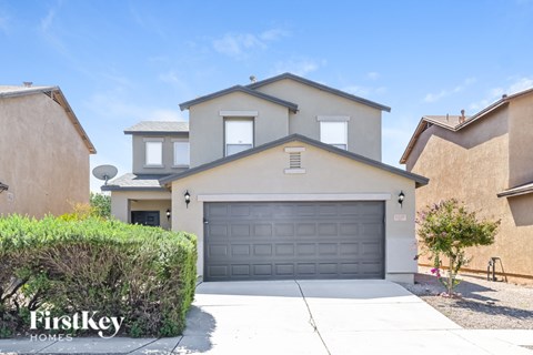 A house with a garage is for sale by FirstKey Homes.