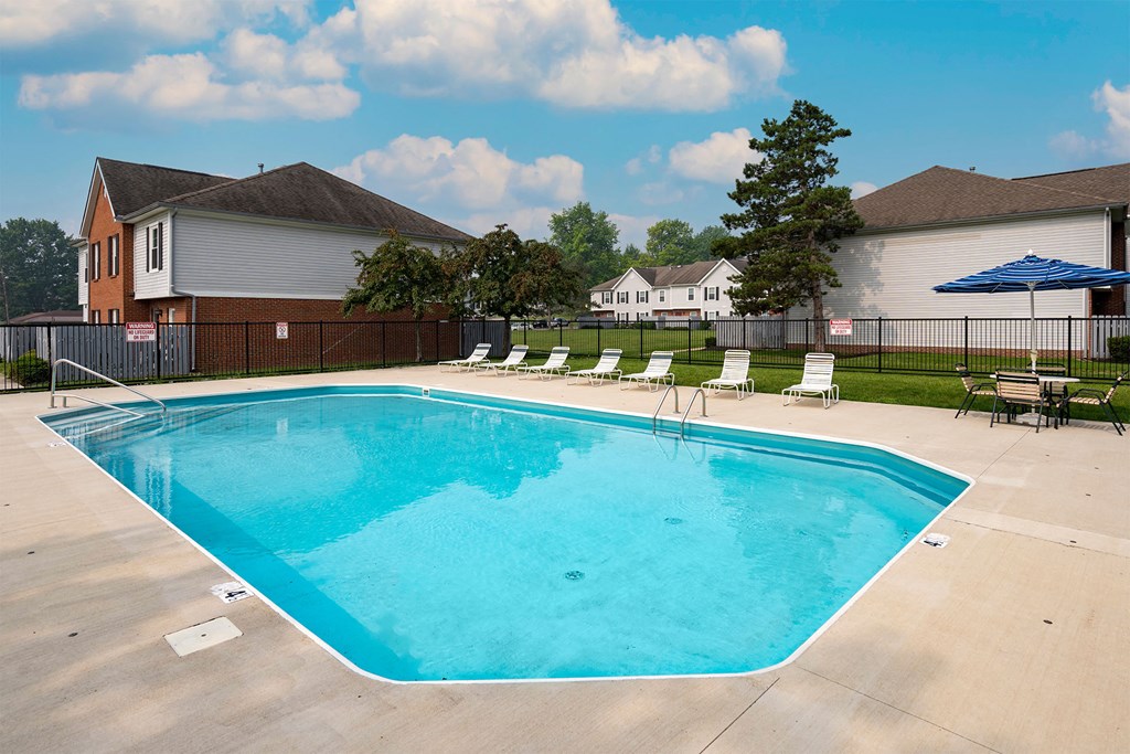 our apartments have a resort style pool with chairs